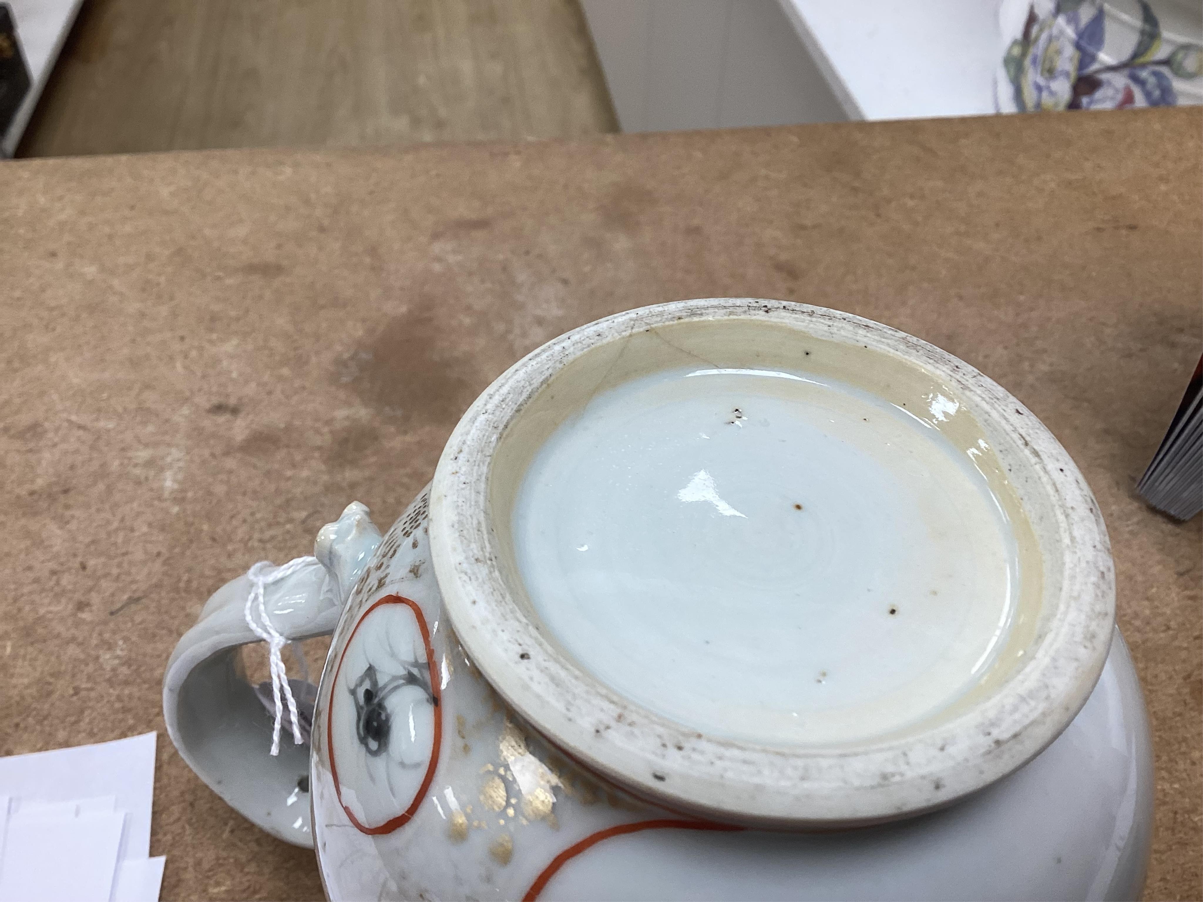 An 18th century Chinese export famille rose mug- 15cm high